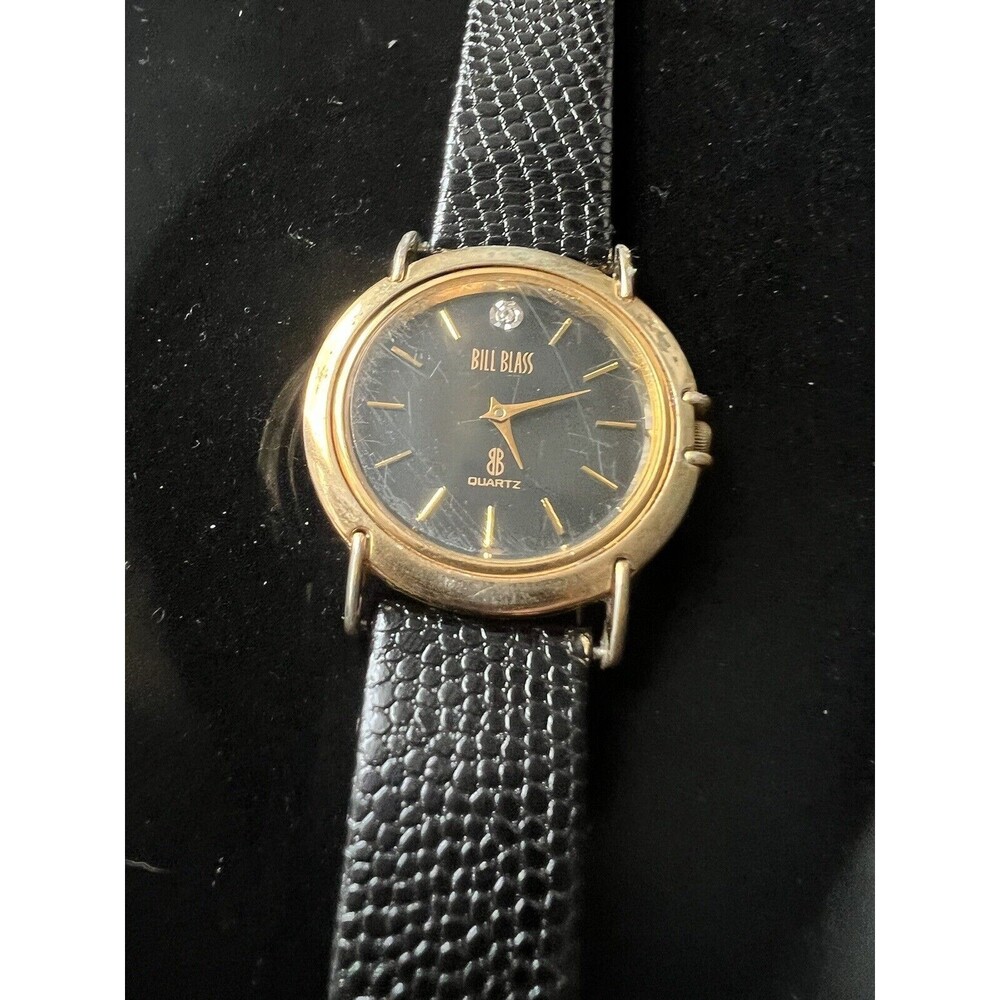 Vintage Bill Blass Gold Toned Stainless Steel Watch w/Black Leather Band